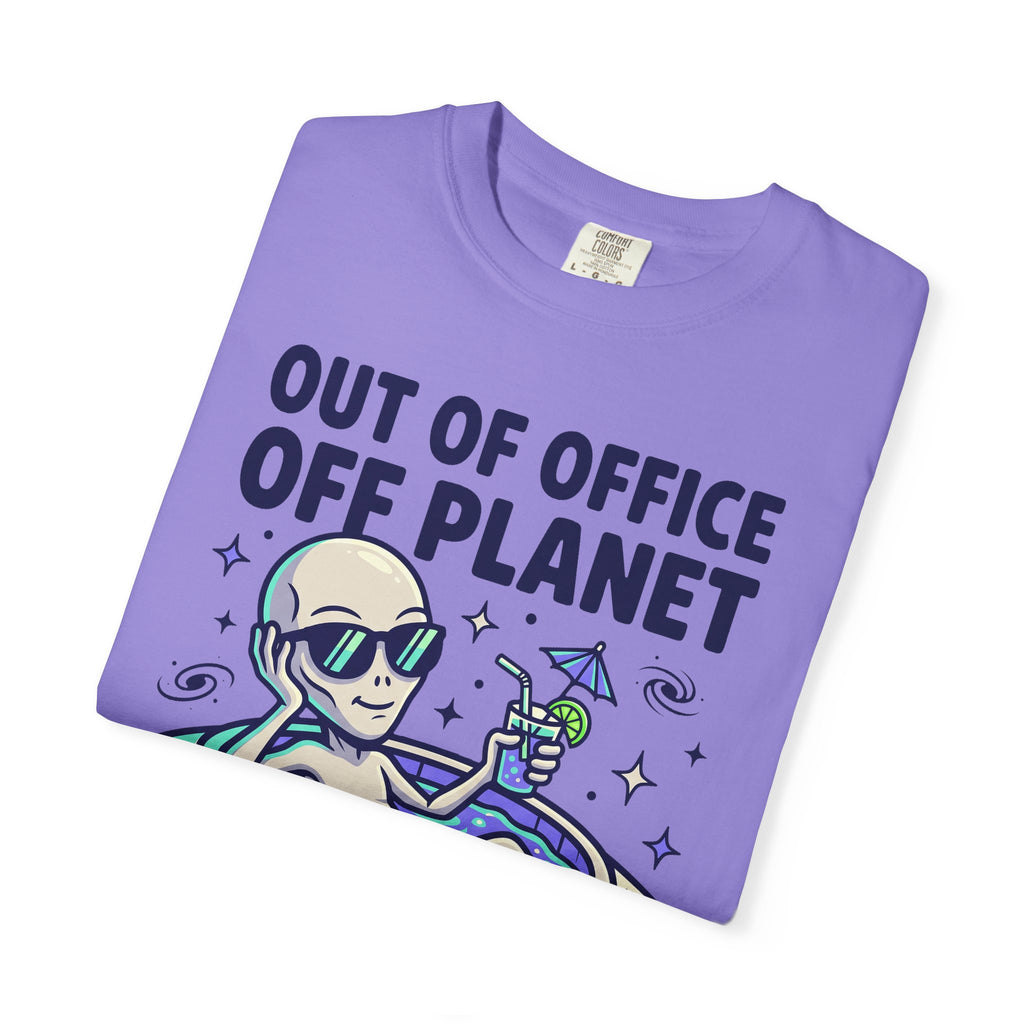 Lavender T-shirt with 'OUT OF OFFICE OFF PLANET' alien and UFO graphic