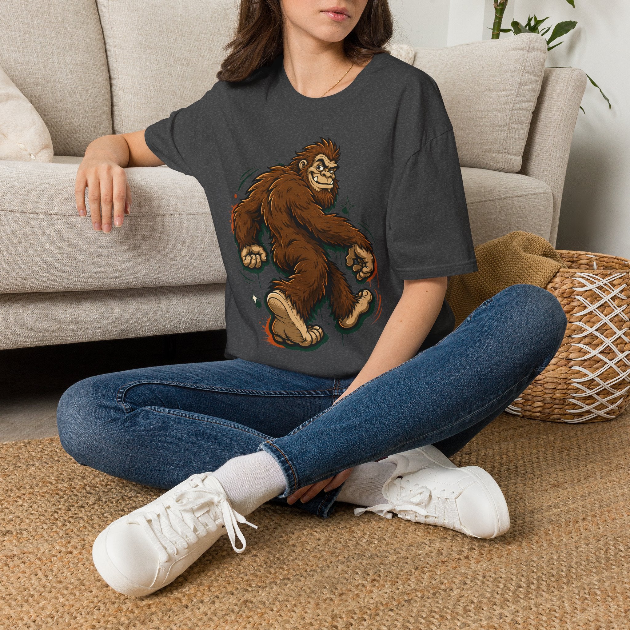 Sport grey T-shirt with running bigfoot cartoon graphic