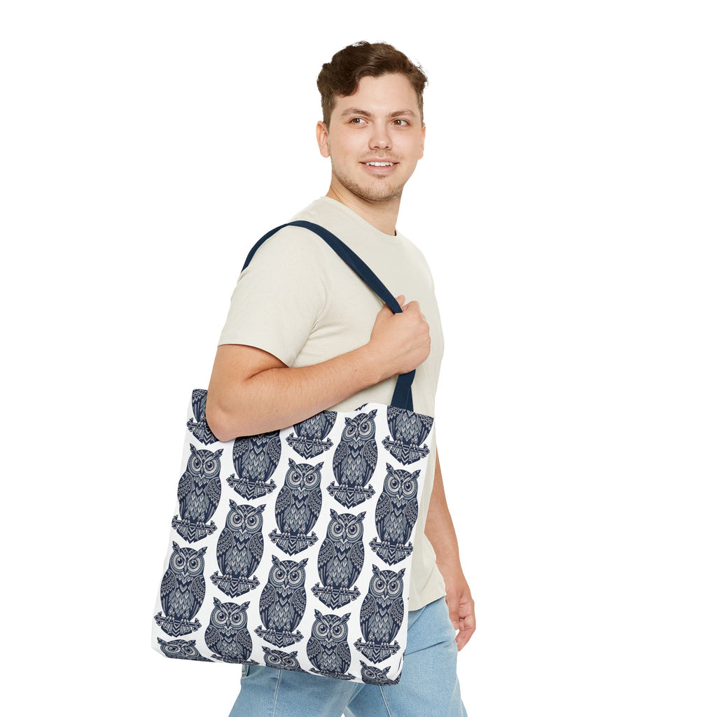 Owl tote bag with navy strap, blue-and-white owl print, carried by man