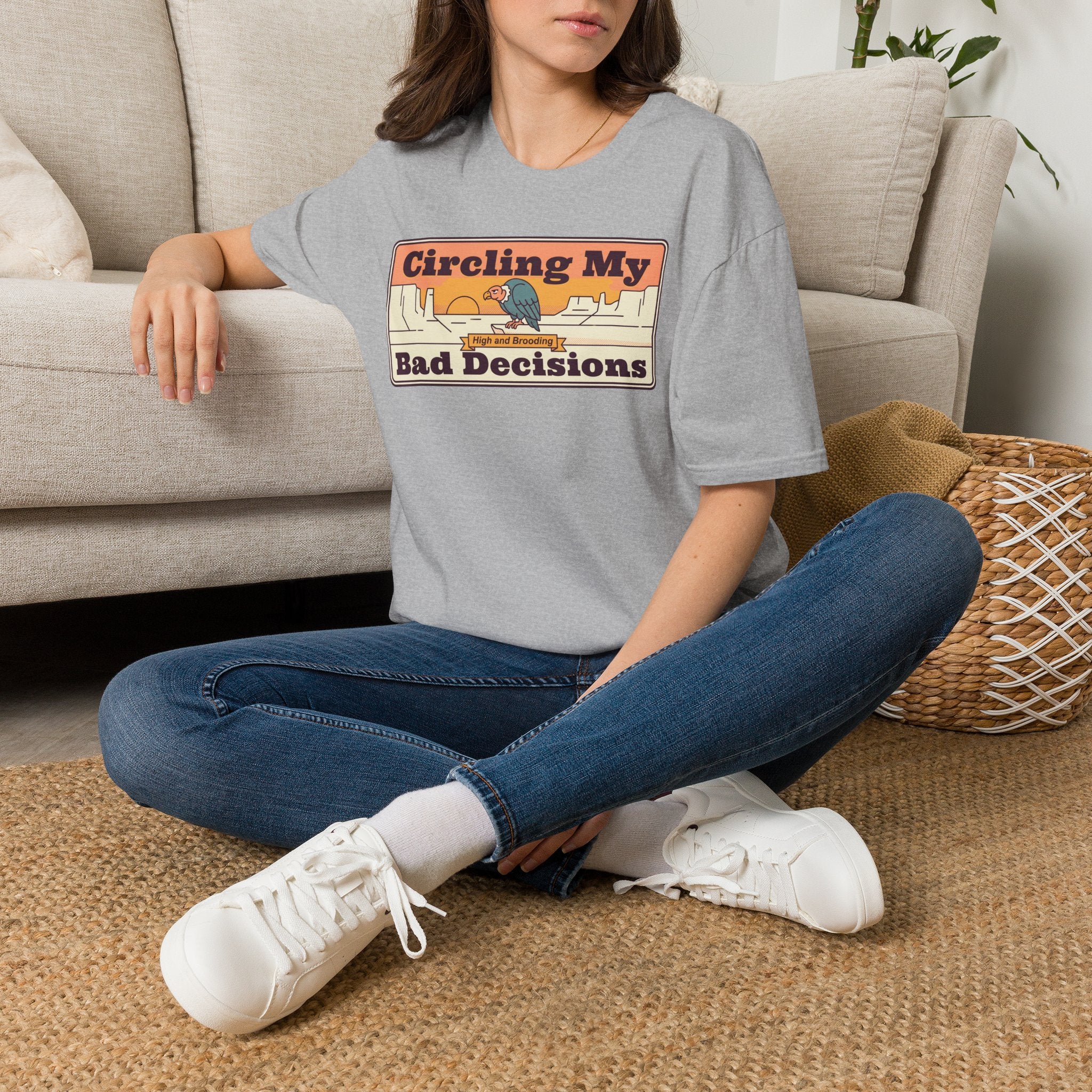 Light gray crew-neck T-shirt with centered “Circling My Bad Decisions” graphic