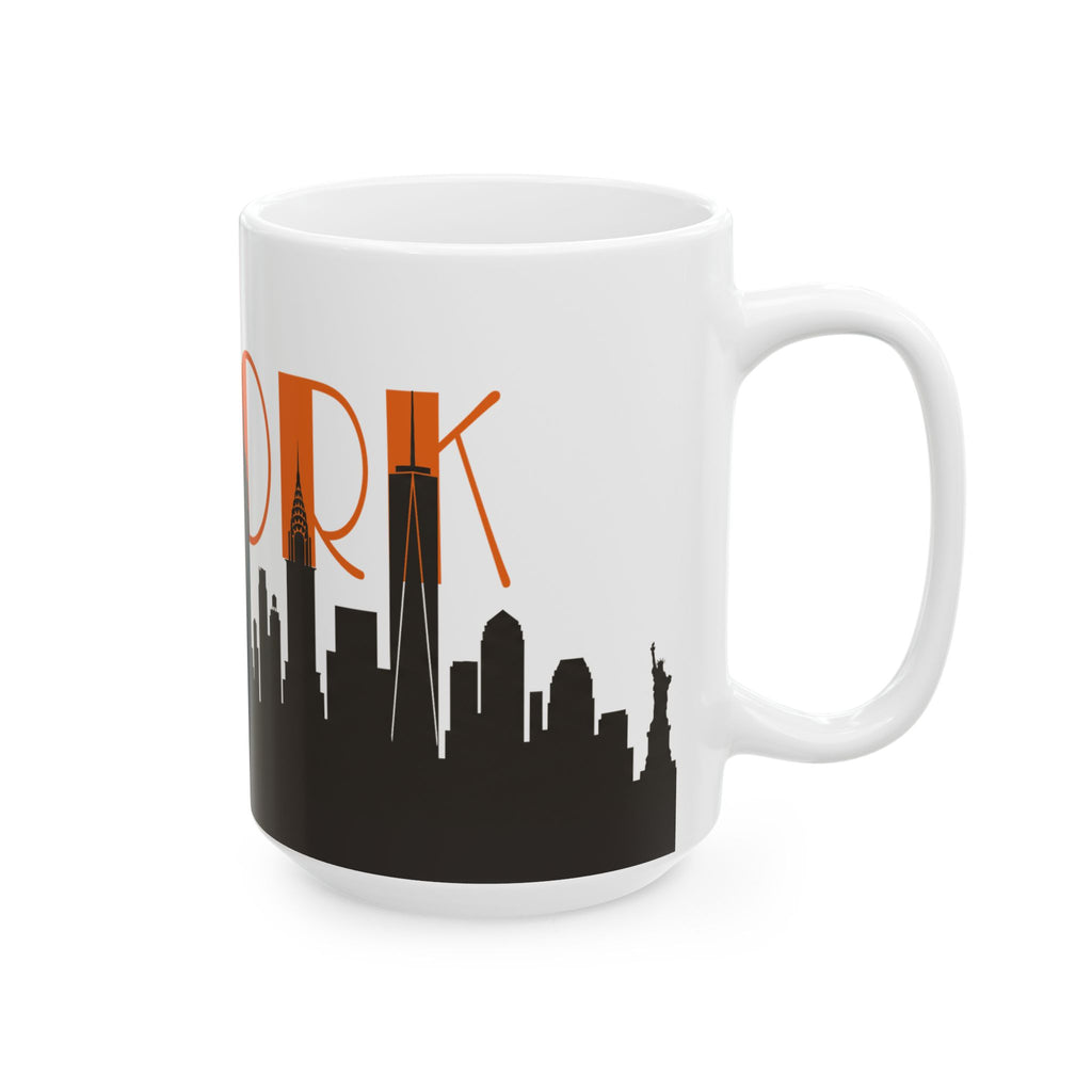 White ceramic coffee mug with orange “ORK” text and black city skyline