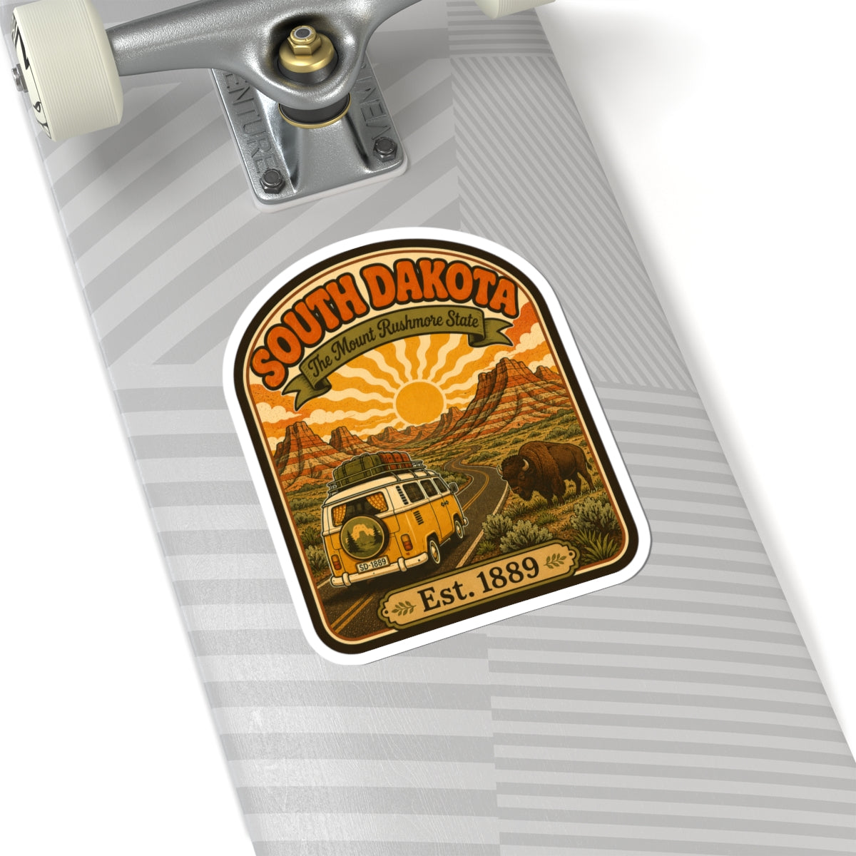 Die-cut South Dakota sticker with striped background art, van, buffalo, and Est. 1889.