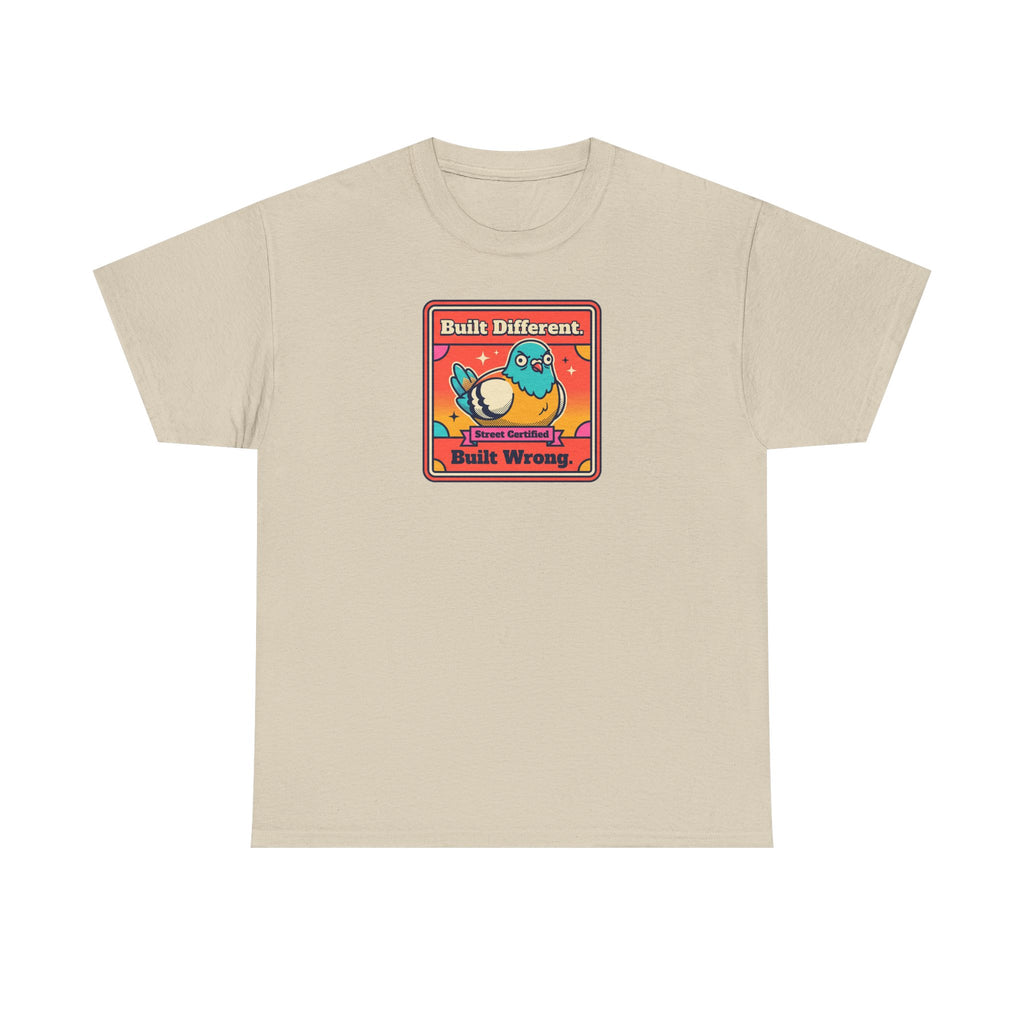 Sand t-shirt with framed bird graphic, 'Built Different' and 'Built Wrong' text.