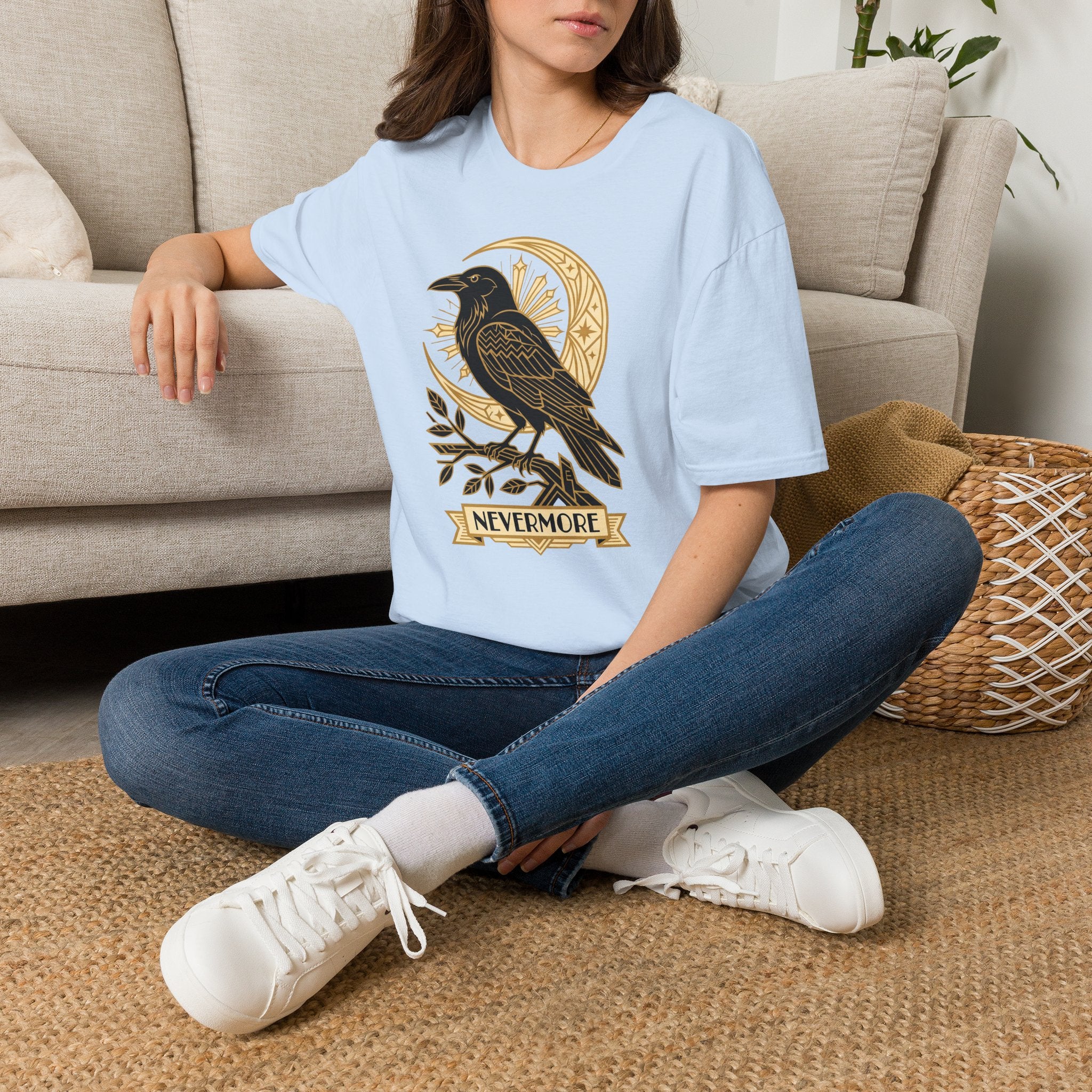 Crewneck T-shirt in light blue with gold raven and moon graphic, short sleeves