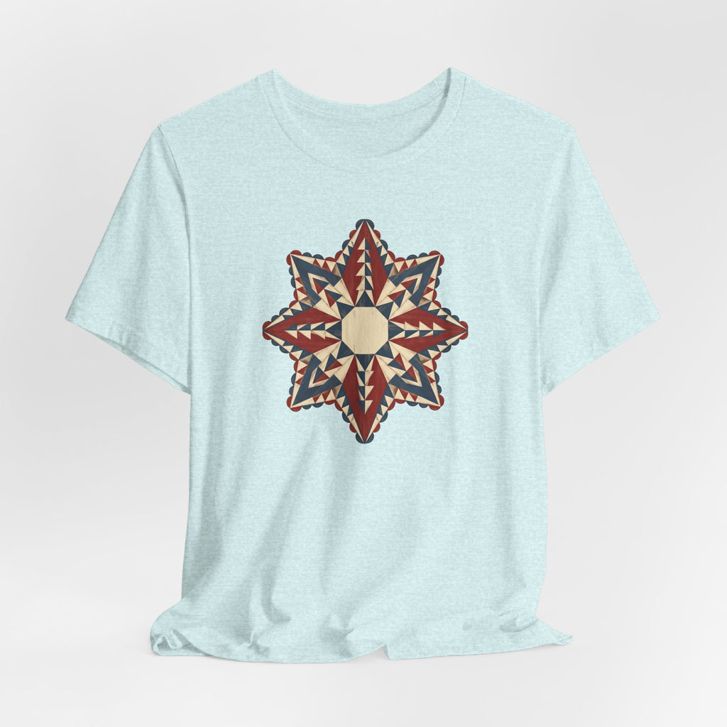 Light blue short-sleeve crew-neck tee with colorful southwestern compass star mandala graphic.