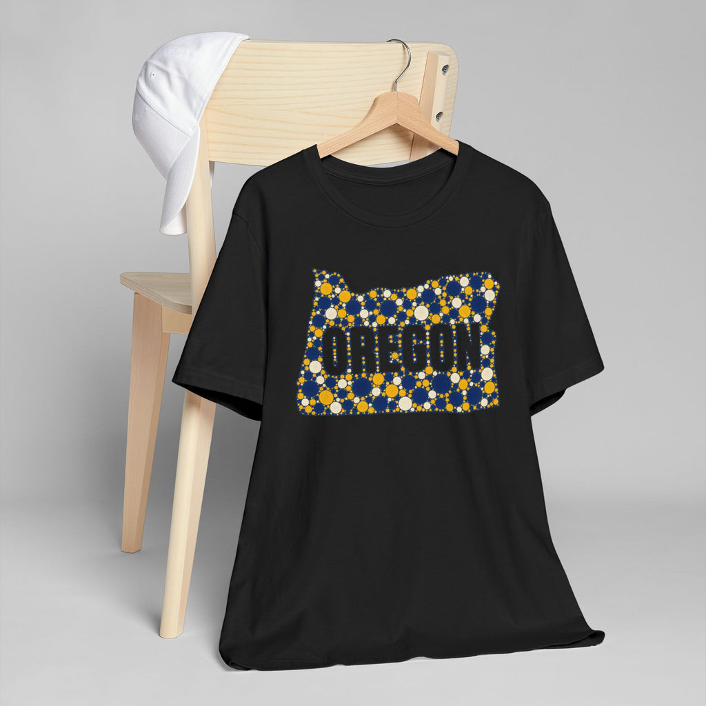 Black t-shirt with Oregon polka dot map graphic in blue and gold on front