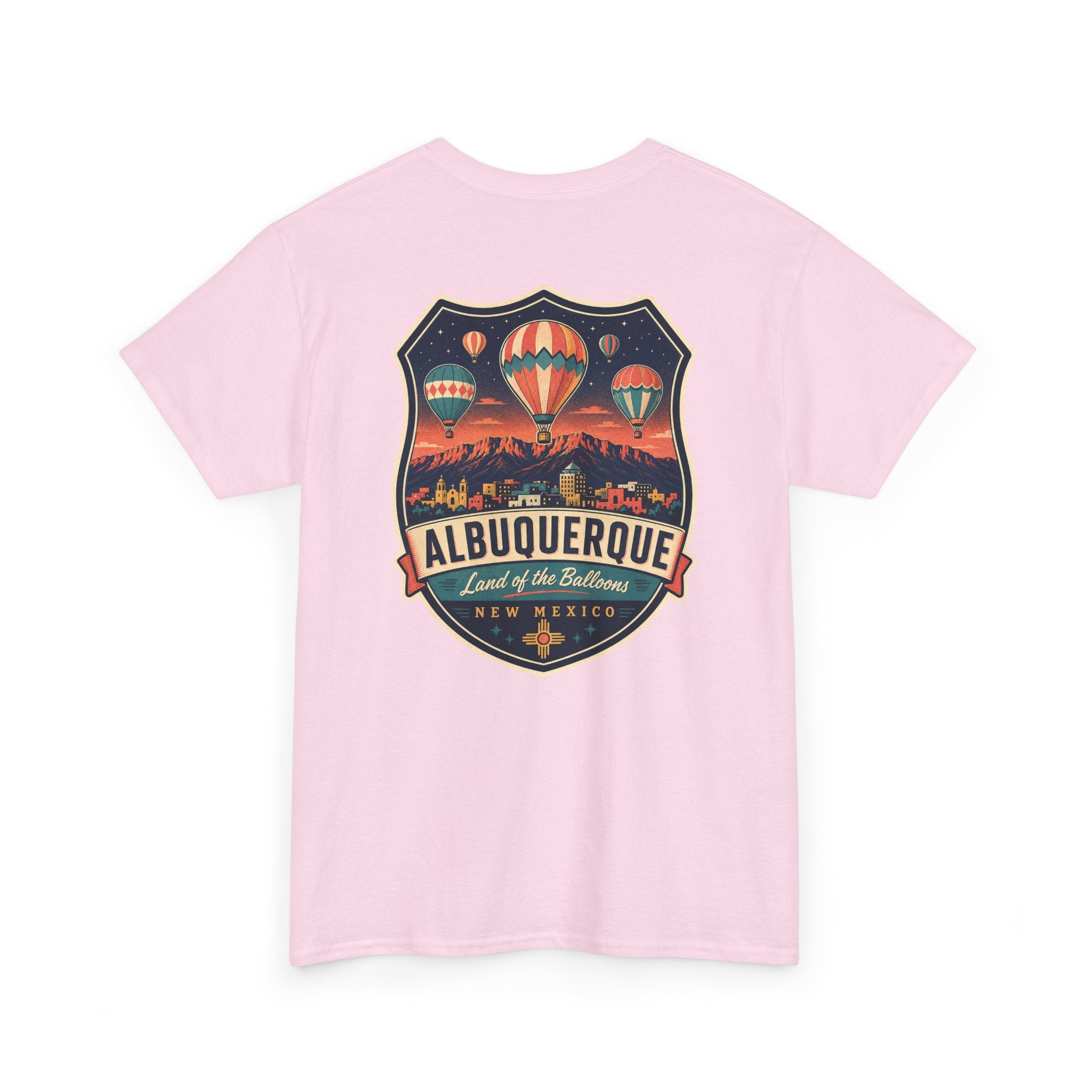 Light pink T-shirt with Albuquerque hot air balloon badge graphic on chest
