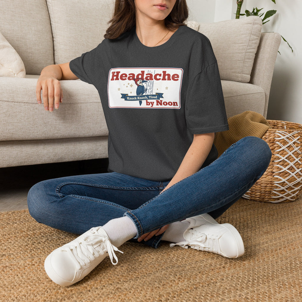 Dark T-shirt with 'Headache by Noon' nurse graphic on chest, crew neck