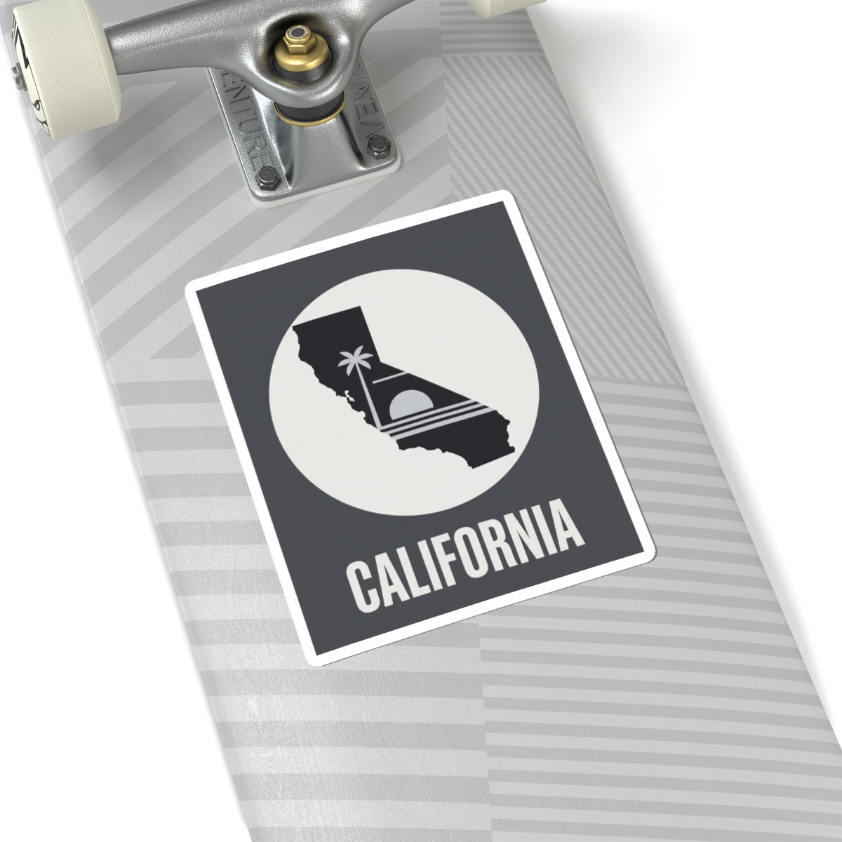 California state silhouette sticker with palm tree icon and CALIFORNIA text on striped surface