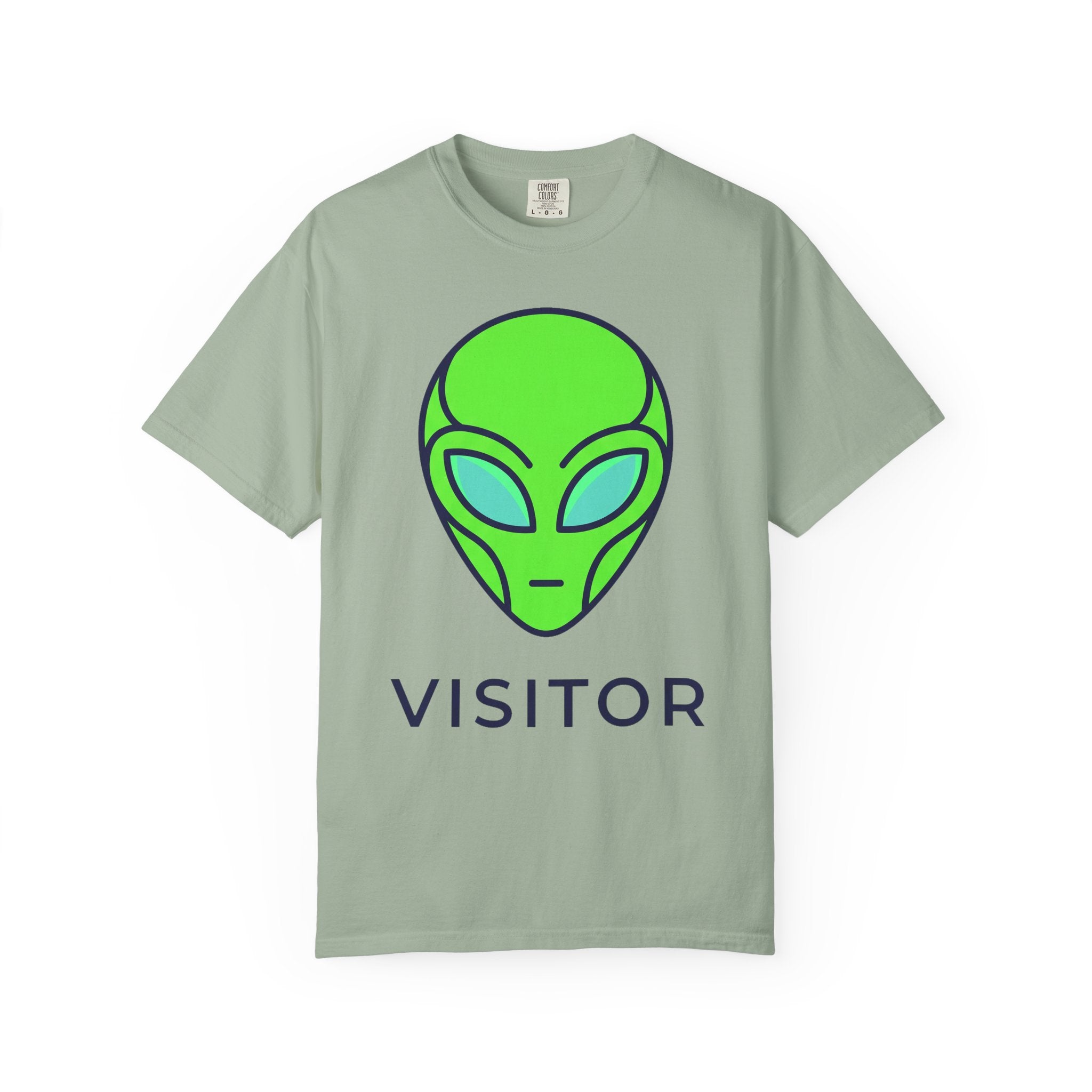 Seafoam green T-shirt with neon green alien head graphic and word VISITOR