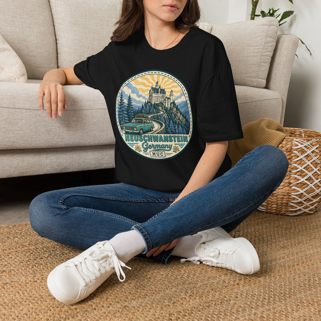 Black crewneck T-shirt with circular illustrated castle graphic on the front