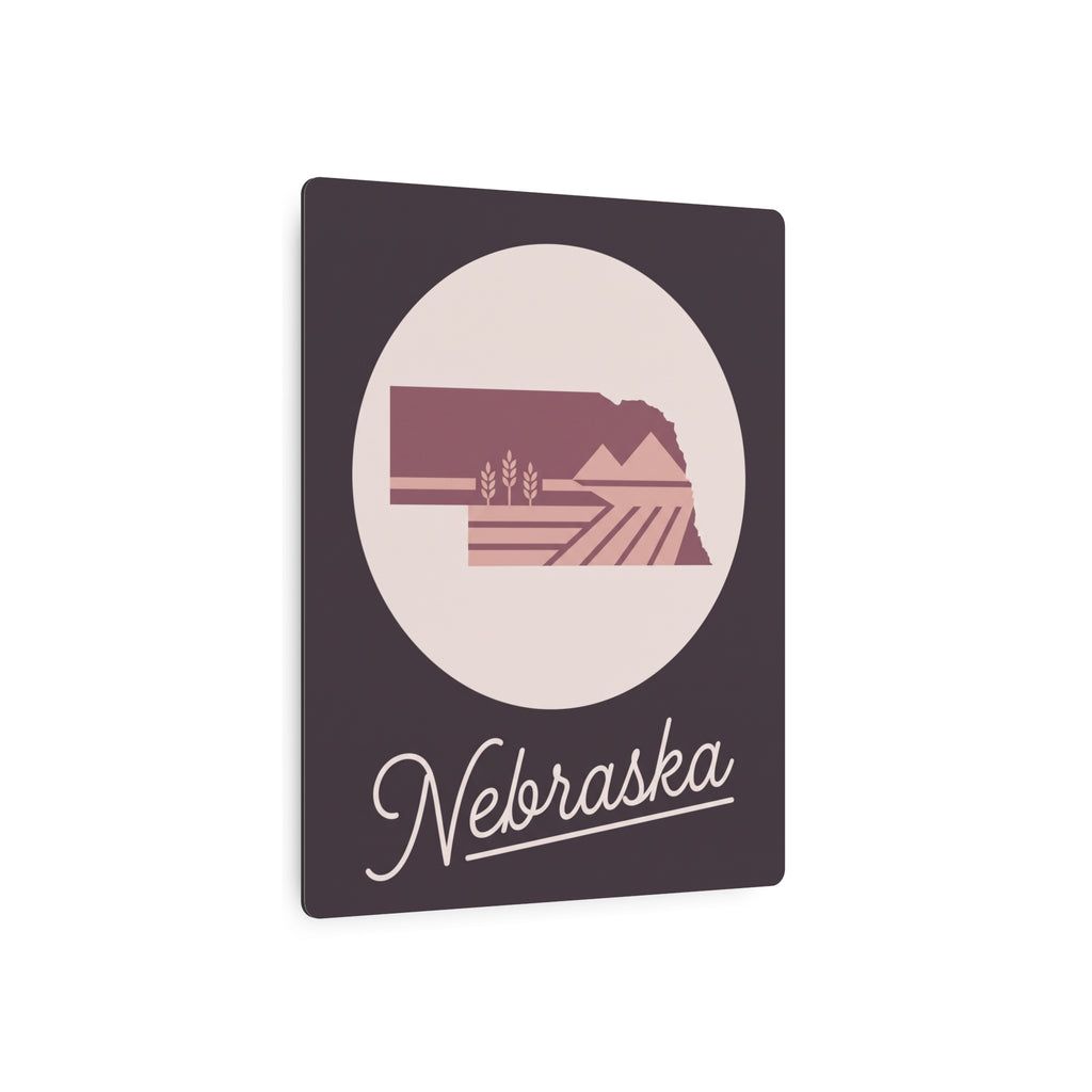 Mauve Nebraska metal wall plaque with circular emblem and 'Nebraska' script