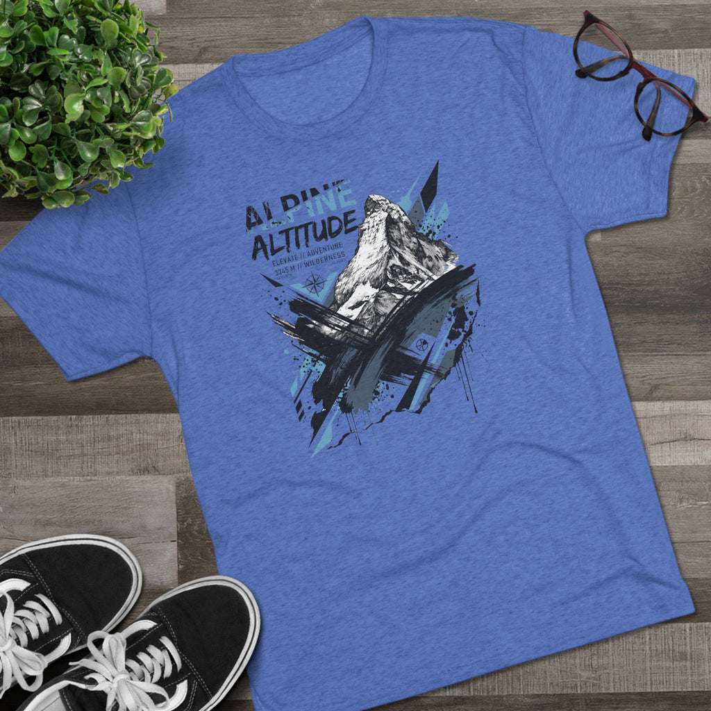 Unisex blue T-shirt with mountain peak graphic in blue and white on front
