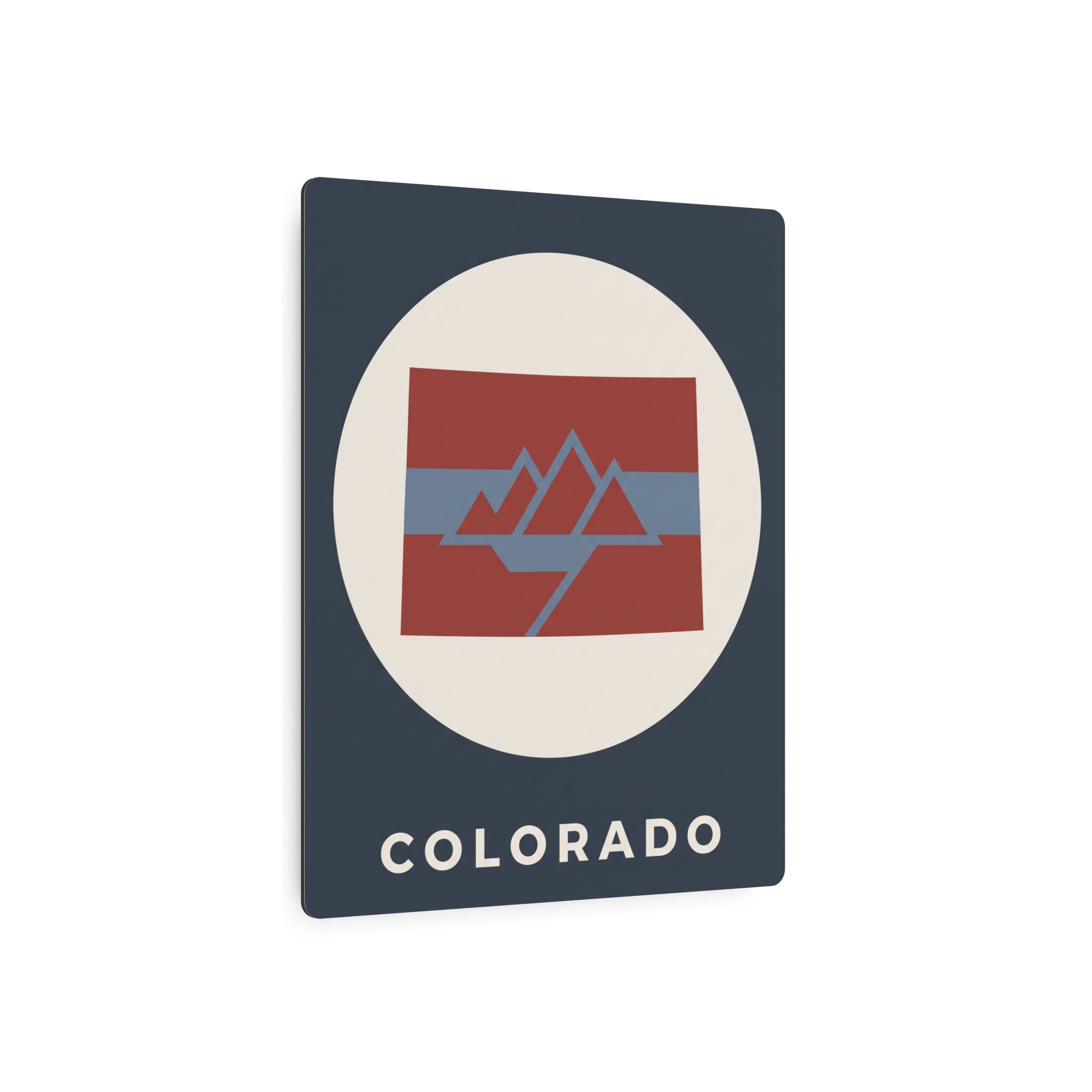 Colorado metal art sign with cream oval, red-blue mountain graphic, and “COLORADO”