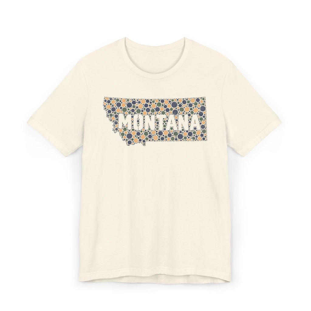 Cream crewneck t-shirt with “MONTANA” mosaic floral outline graphic on front.