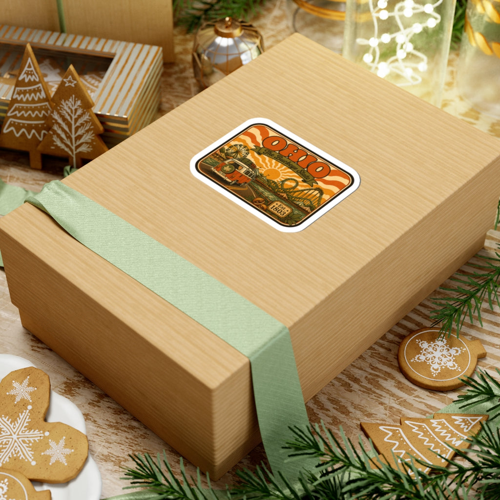 Ohio retro sticker on a wrapped gift box, orange rides and camper, Est. 1803