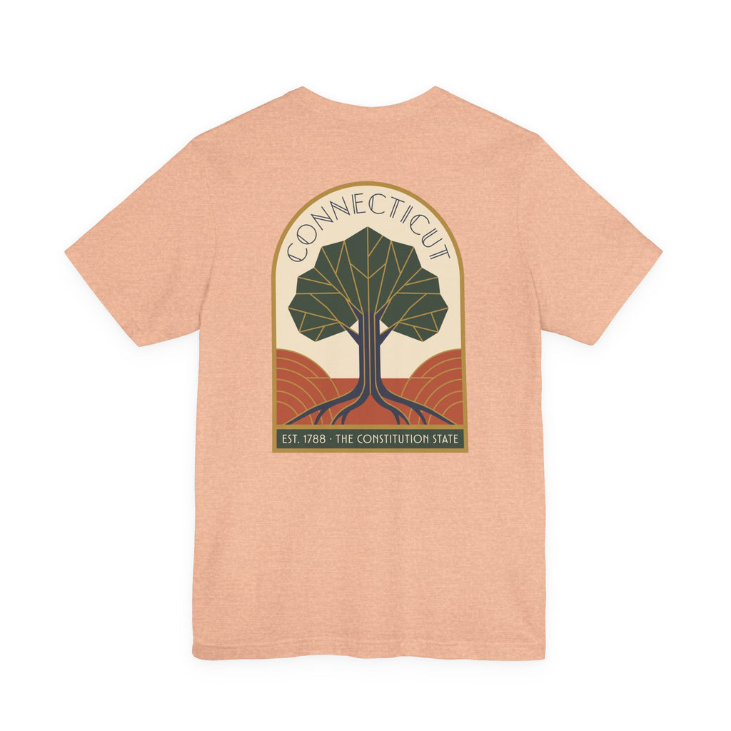 Connecticut tree graphic t-shirt, peach, front emblem with tree and “Connecticut” text