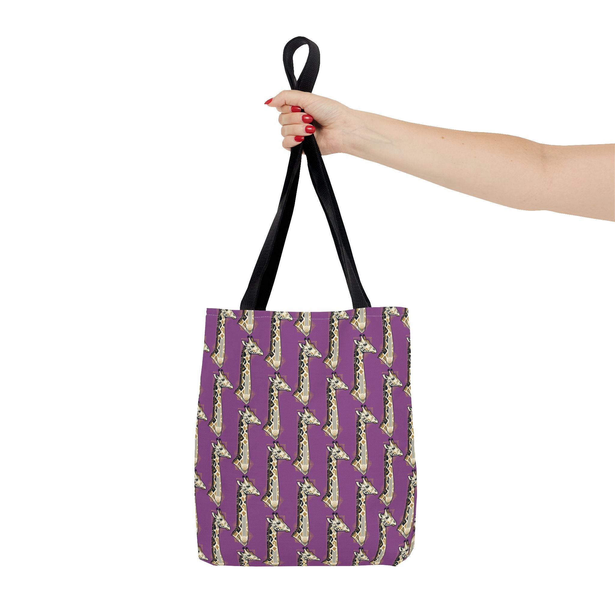 Purple tote bag with saxophone pattern, black top handles held by hand