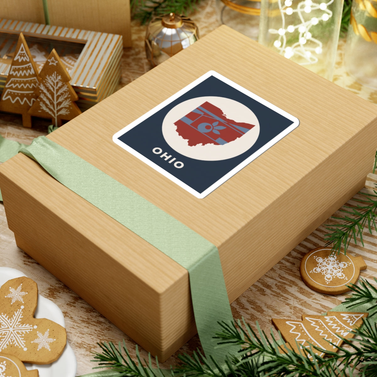 Ohio sticker on a gift package, square graphic with map, apple icon, and OHIO label
