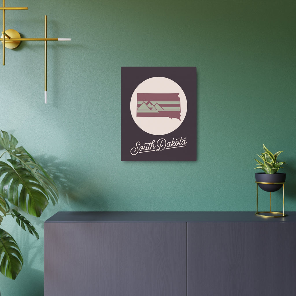 Mauve square metal wall art featuring South Dakota circular cream graphic and cursive text