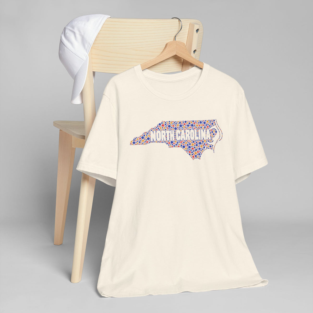 Natural crewneck T-shirt with colorful North Carolina floral map graphic