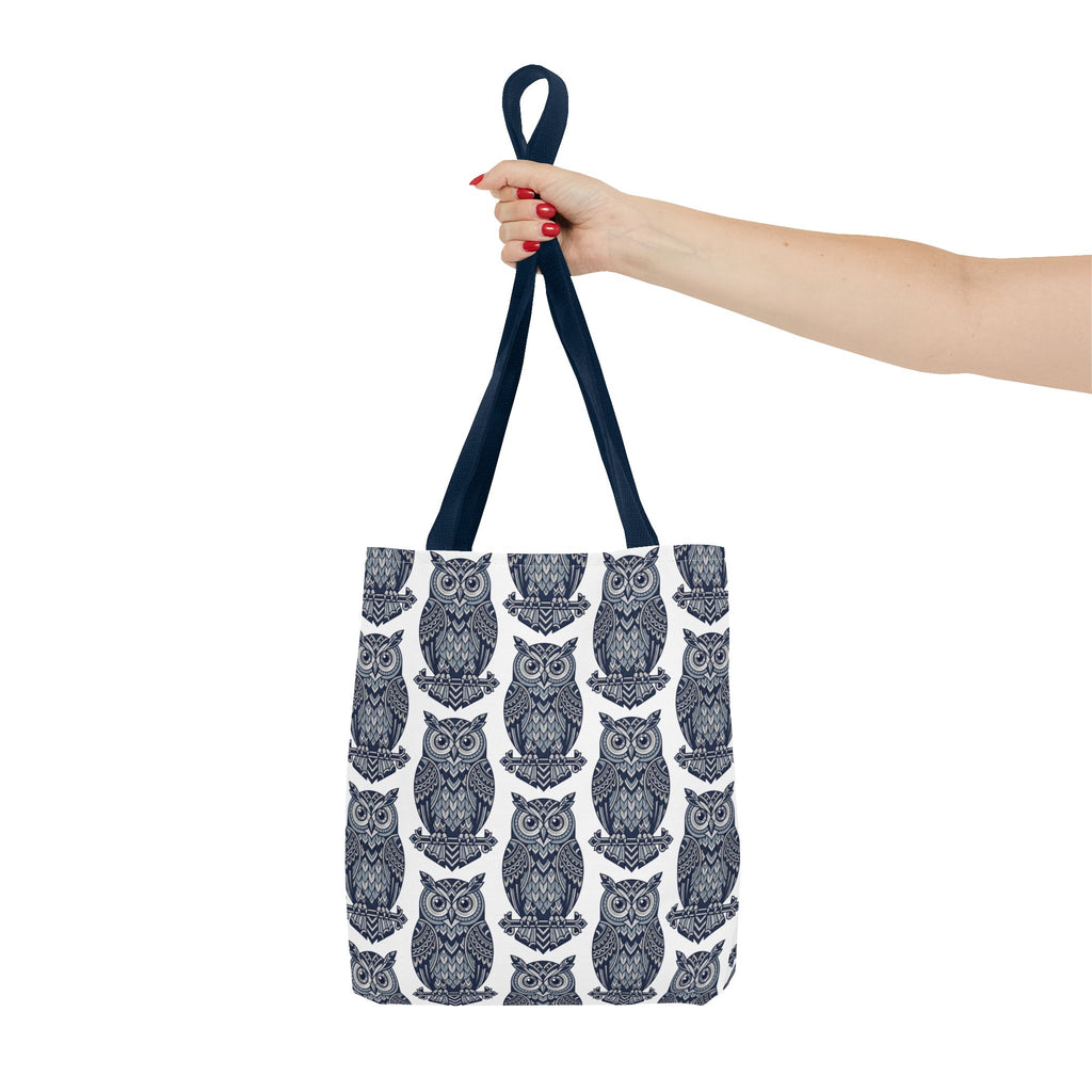 Tote bag with navy handles and repeating navy owl pattern on white fabric