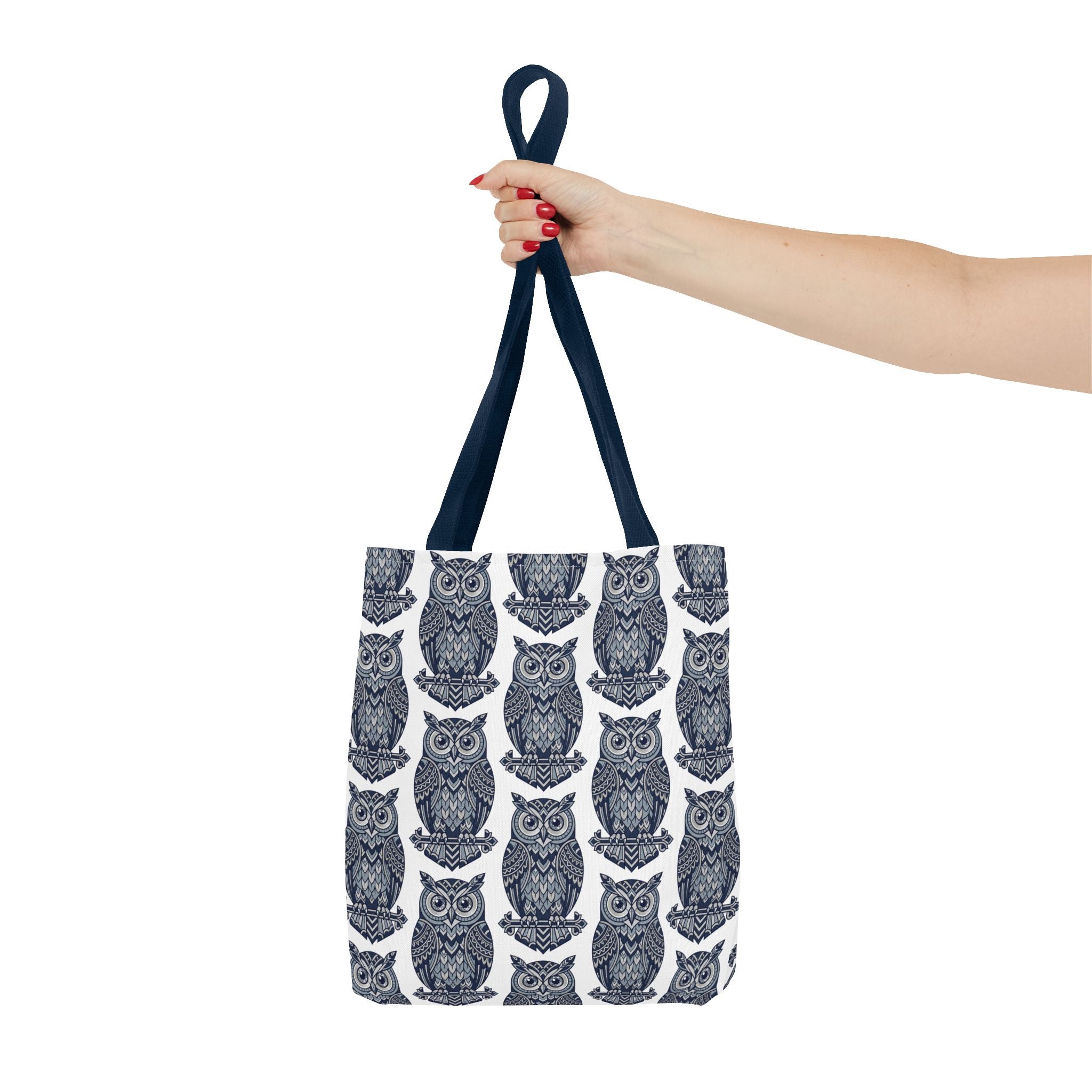 Tote bag with navy handles and repeating navy owl pattern on white fabric
