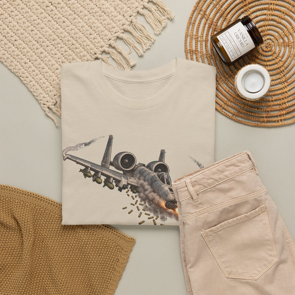 Beige short-sleeve crewneck T-shirt with jet attack graphic on front.