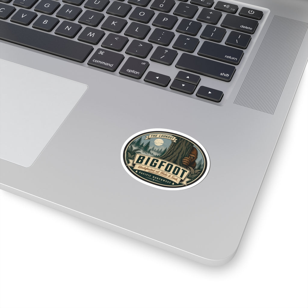 Small round kiss-cut Bigfoot outdoor logo vinyl sticker on laptop trackpad area