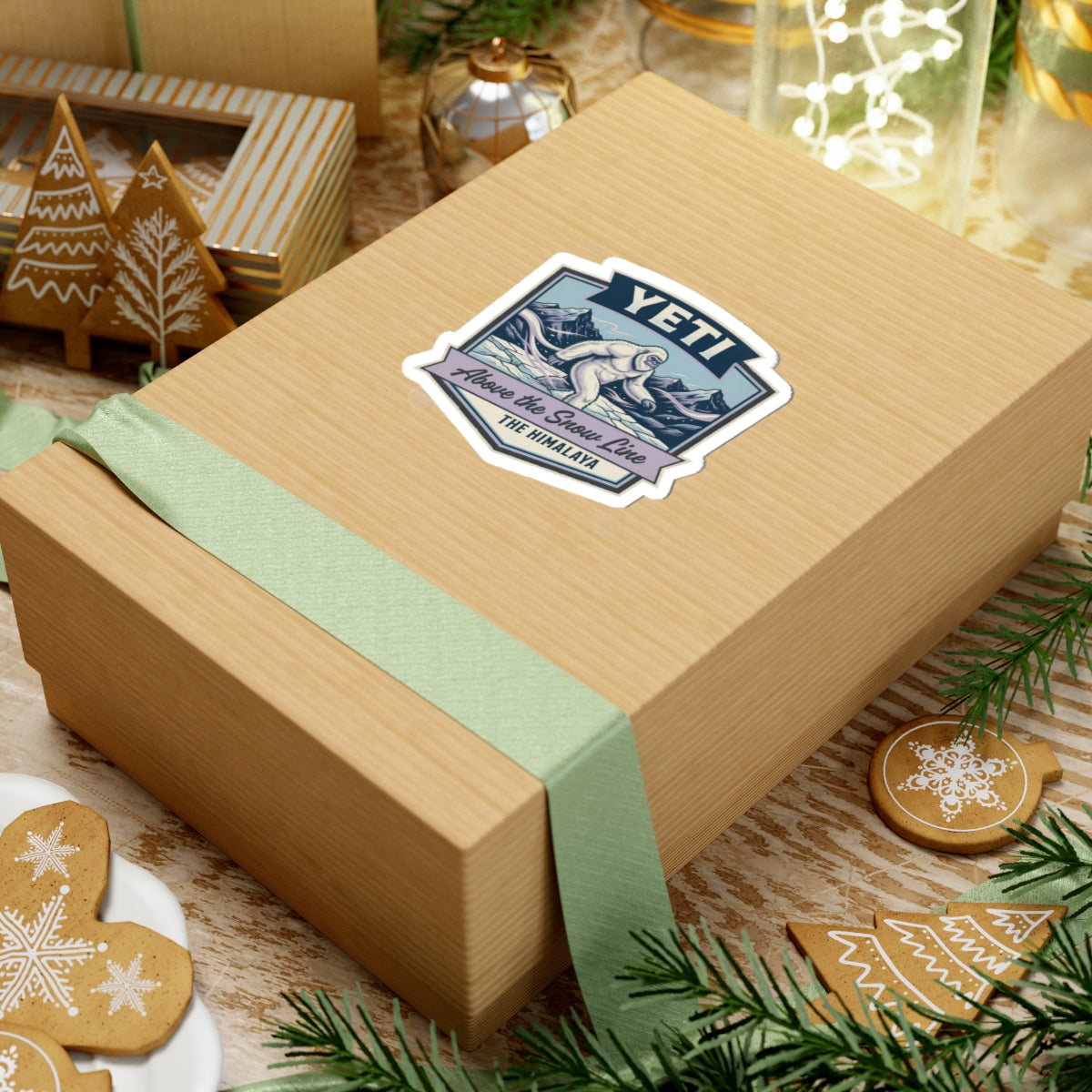 YETI die-cut sticker on wrapped gift box, Himalayan sasquatch above the snow line