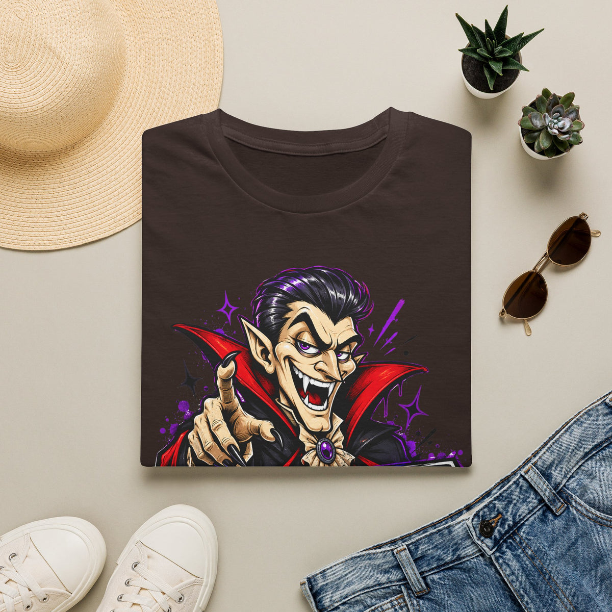 Dark brown T-shirt with colorful cartoon vampire pointing graphic