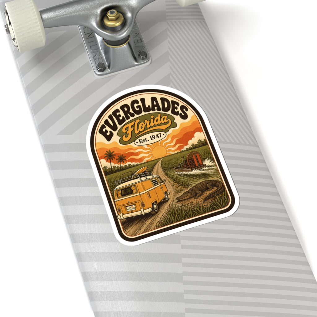 Everglades Florida vintage camper sticker on gray board, orange van and sunset landscape