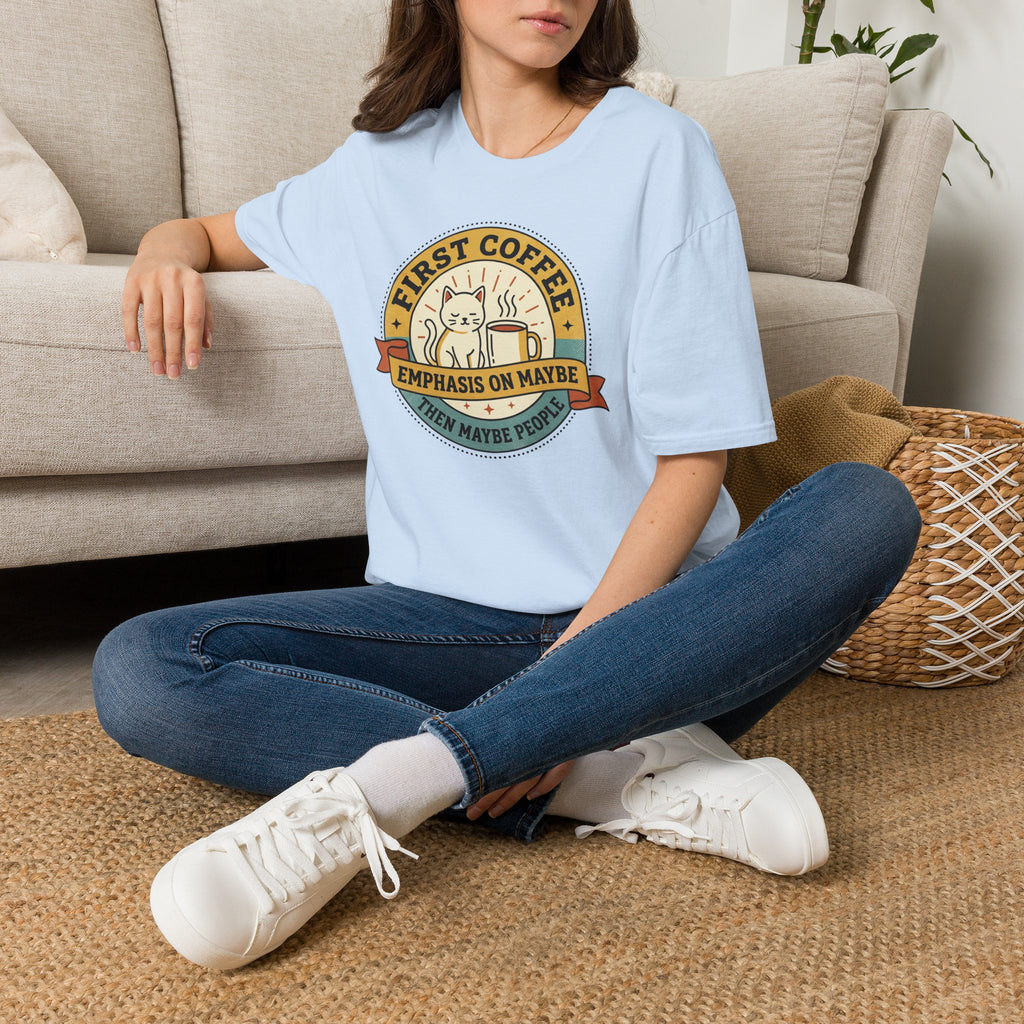 Light blue T-shirt with front cat coffee emblem, worn by model