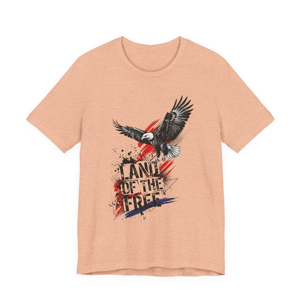 Peach eagle graphic t-shirt with distressed "Land of the Free" text and flag accents