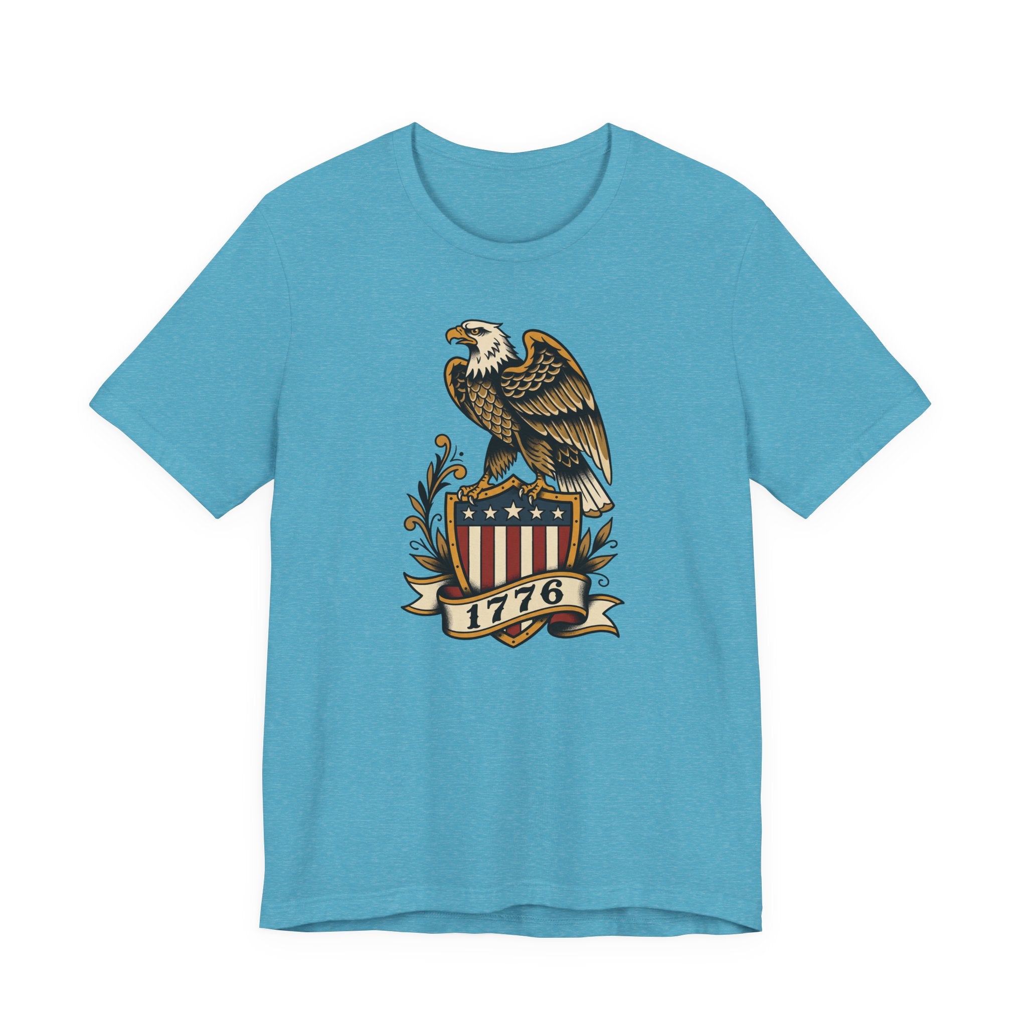 Graphic T-shirt, light blue, front features gold eagle and 1776 shield logo.