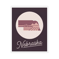 Square Nebraska state sticker showing a circle farmland graphic with cursive “Nebraska”