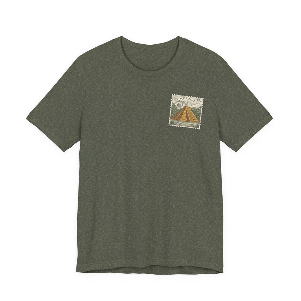 Charcoal gray t-shirt with small vintage-style Mexico stamp graphic at upper chest