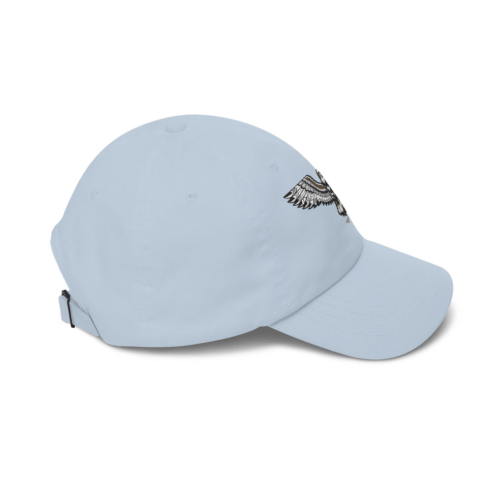 Light blue baseball cap angled view with embroidered eagle patch on side