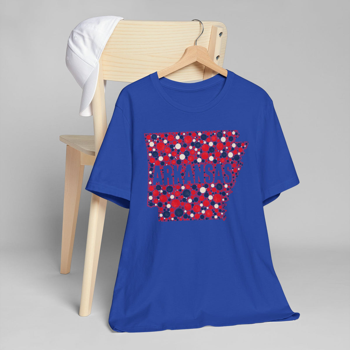 Royal blue crew-neck t-shirt with red and blue dotted Arkansas graphic