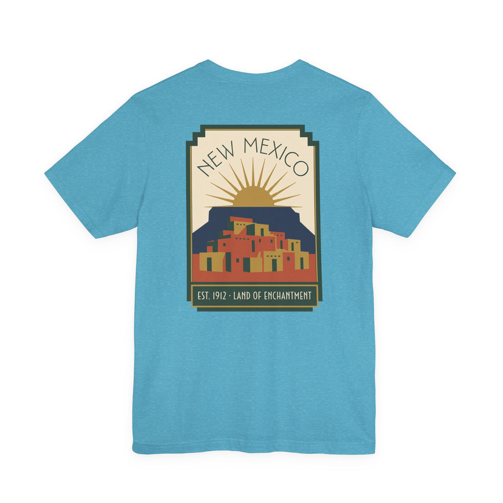 Light aqua T-shirt with New Mexico sunset Pueblo art graphic in a square frame