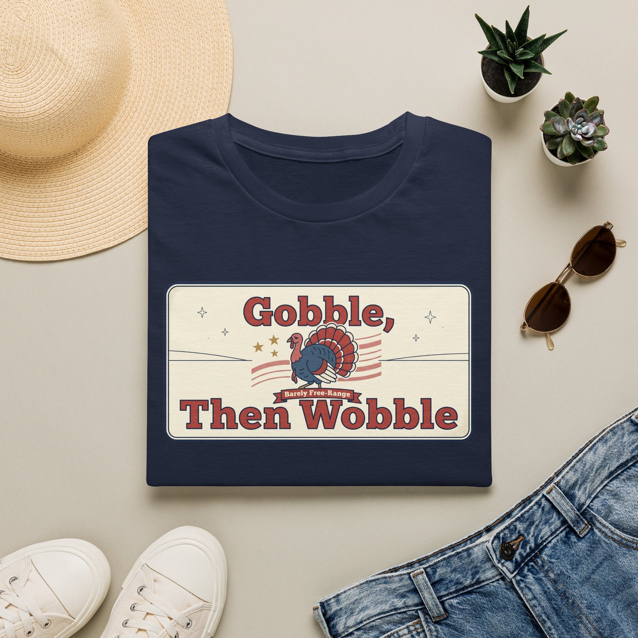 Navy T-shirt with retro turkey graphic and “Gobble, Then Wobble” lettering