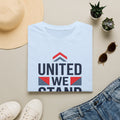 Light blue crewneck T-shirt with 'United We Stand' patriotic graphic on front