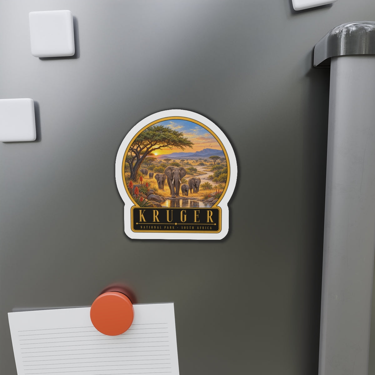 Die-cut vinyl fridge magnet, arched elephants artwork with KRUGER title and landscape