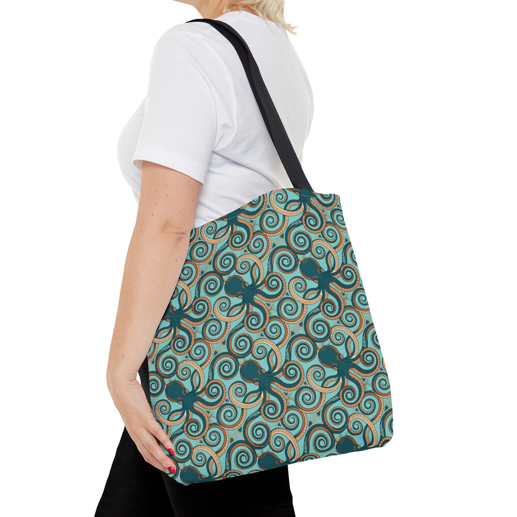 Teal octopus swirl tote bag with black strap