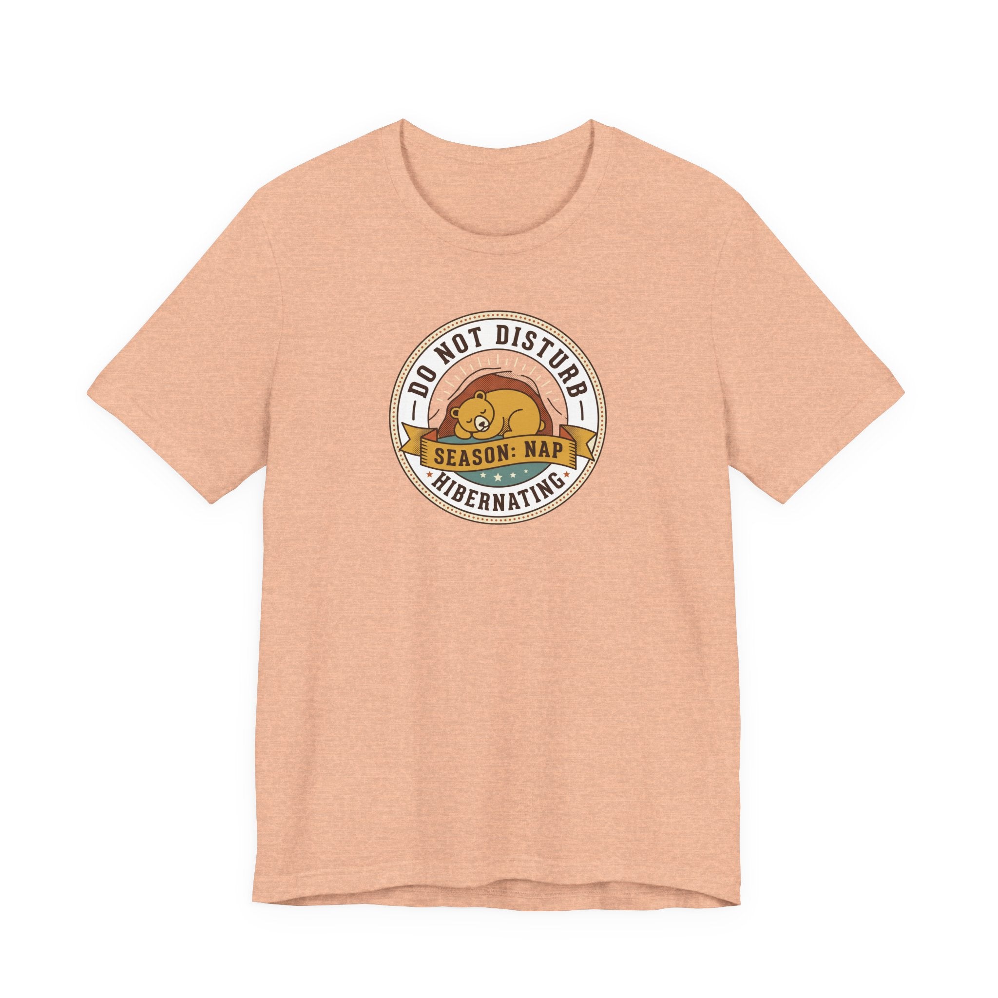 Light peach T-shirt with hibernating bear "Do Not Disturb" circular graphic on chest