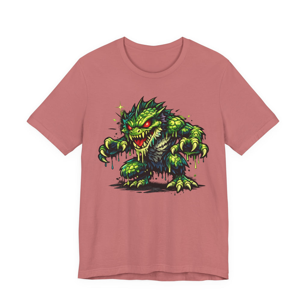 Dusty rose T-shirt with green swamp monster illustration graphic on front