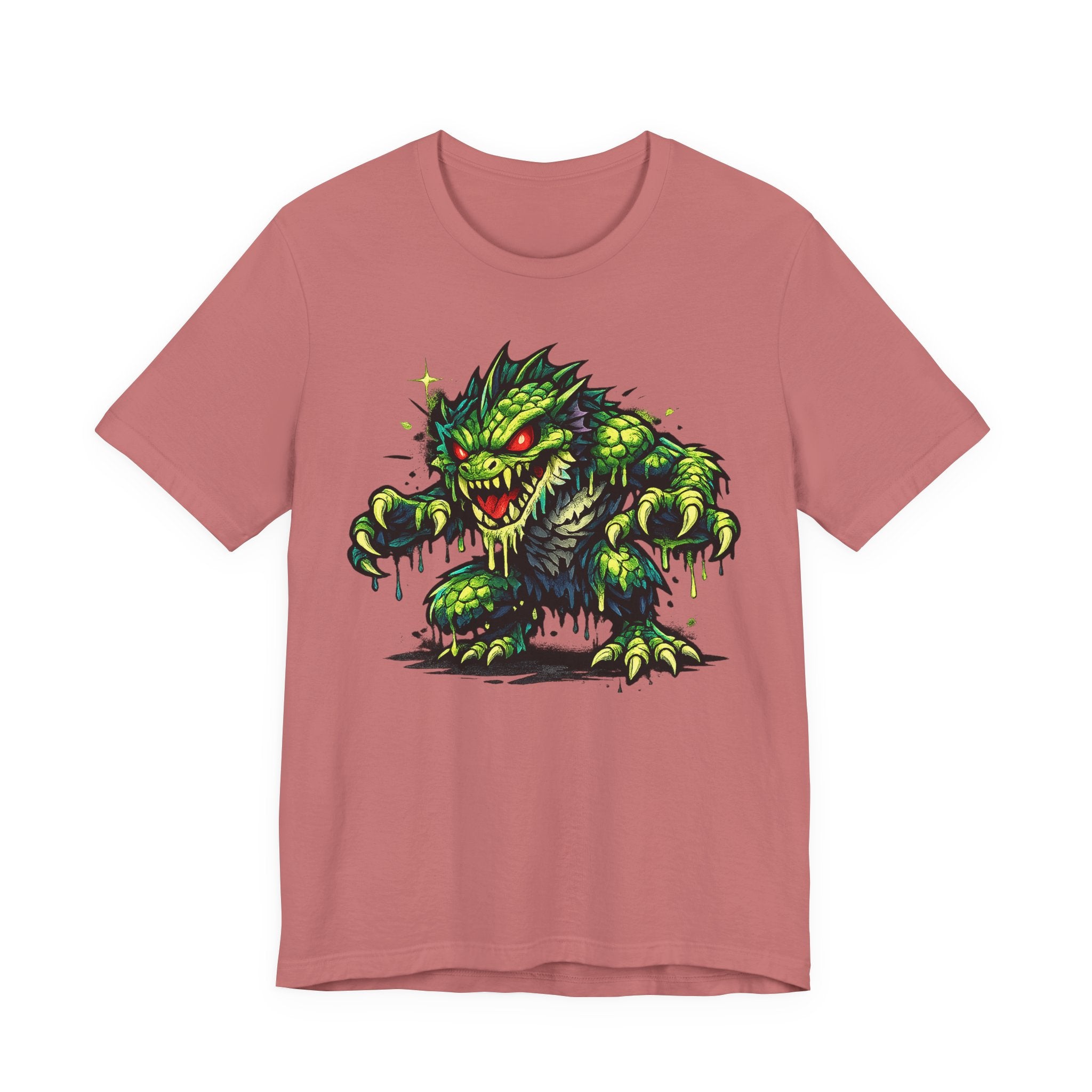 Dusty rose T-shirt with green swamp monster illustration graphic on front