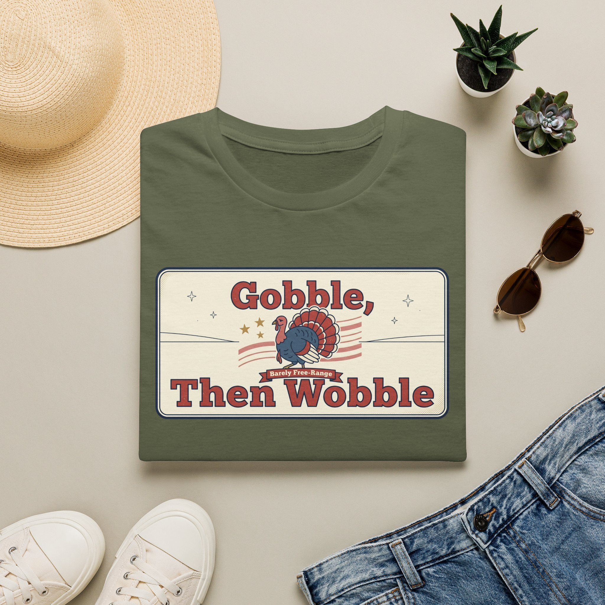 Olive green T-shirt with retro turkey graphic and “Gobble, Then Wobble” text
