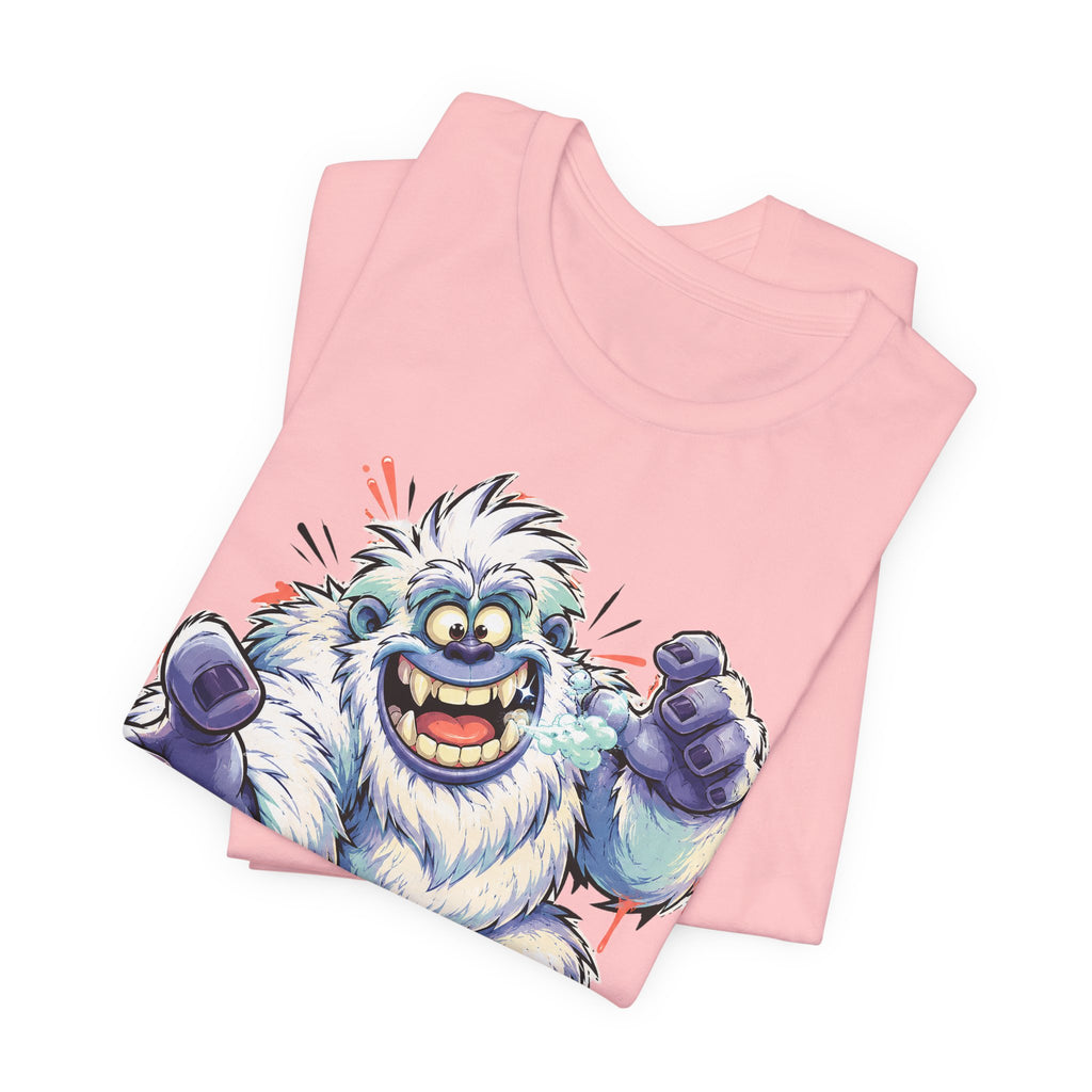 Light pink T-shirt with cartoon snow monster graphic, blue fur and raised fists