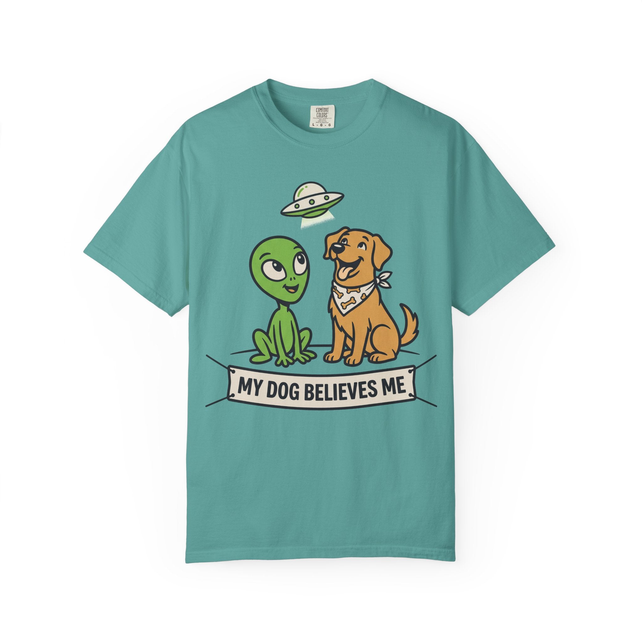 Teal t-shirt with cartoon alien, dog, and "My Dog Believes Me" graphic